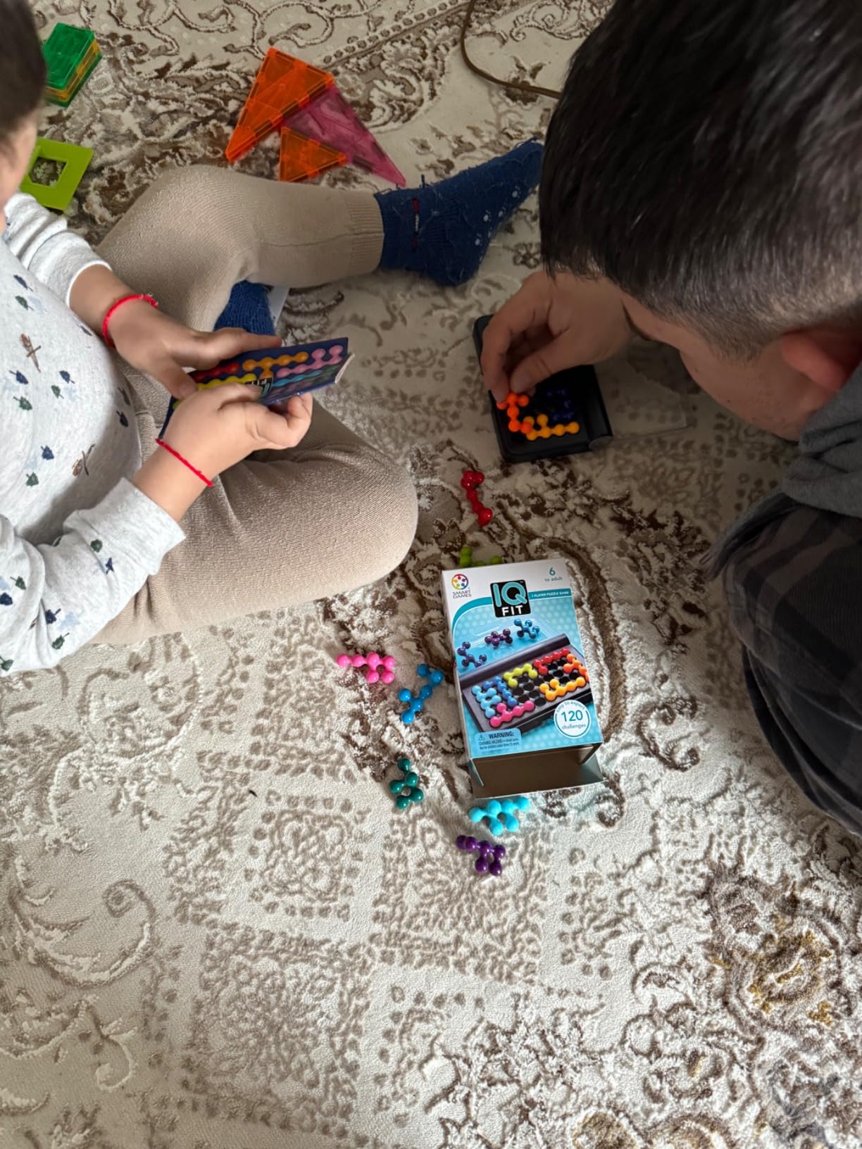SmartGames IQ Fit - Compact Travel Puzzle Game with 120 3D Challenges, Brain-Teasing Logic Game for Kids & Adults, STEM Toy for Ages 6 to Adult, Portable Brain Teaser for On-The-Go Fun customer photo 1