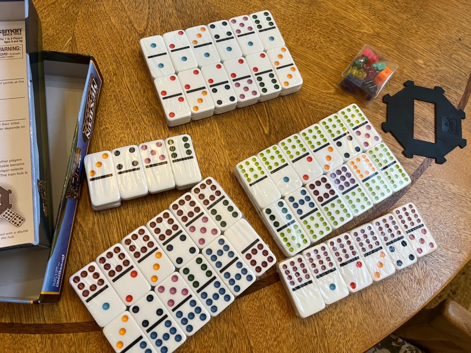 Mexican Train Dominoes - Beautiful Color Dot Double 12 Dominoes Set - Includes Train Markers and Hub by Pressman Multi Color, 5