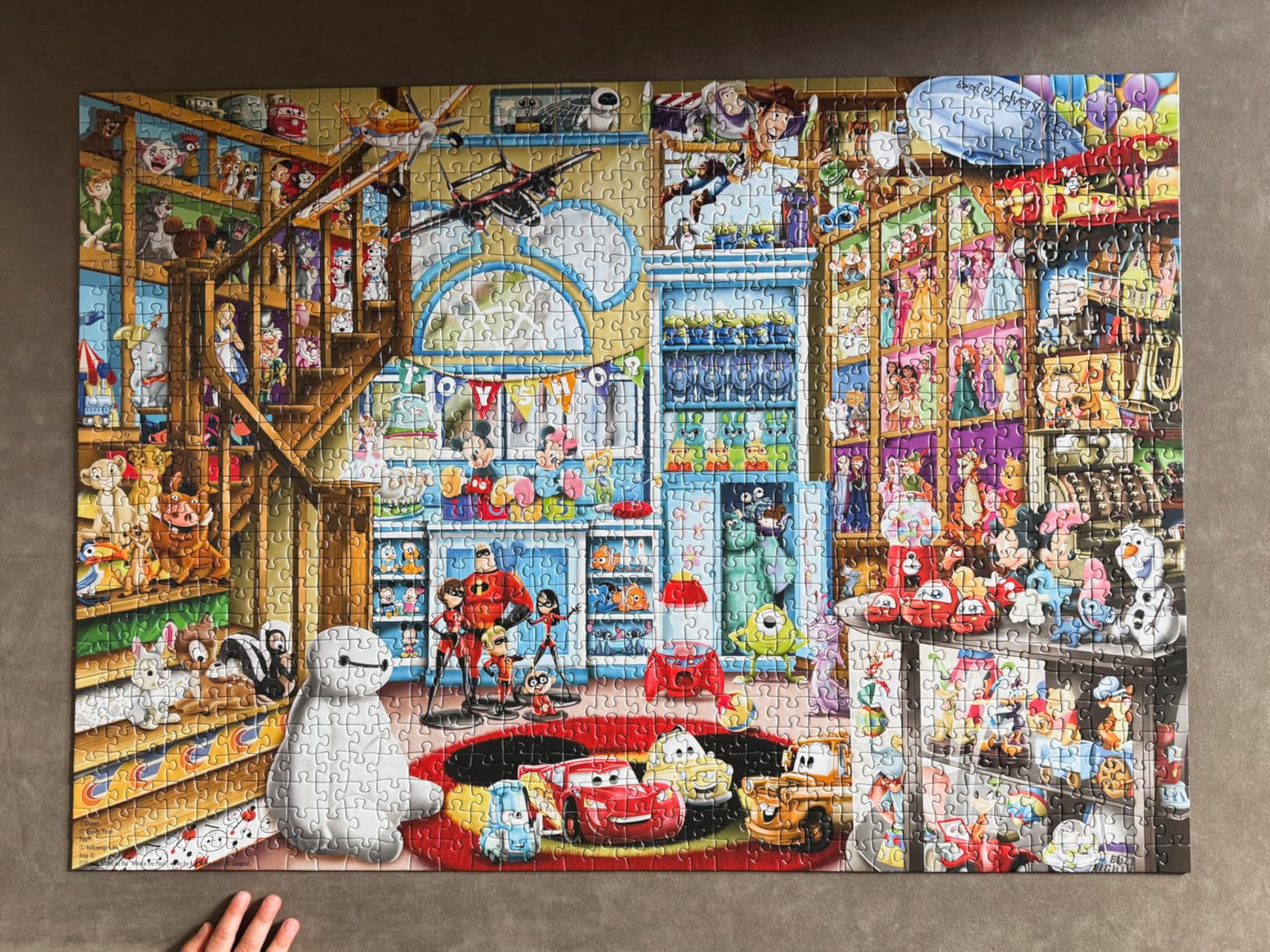 Ravensburger - Disney & Pixar - 1000 Piece Jigsaw Puzzle - Stunning, Vivid Imagery of Favorites Mickey Mouse, Olaf & More - Toy Shop Scene - Ideal Gift - Frameable Art - Puzzles for Adults customer photo 2