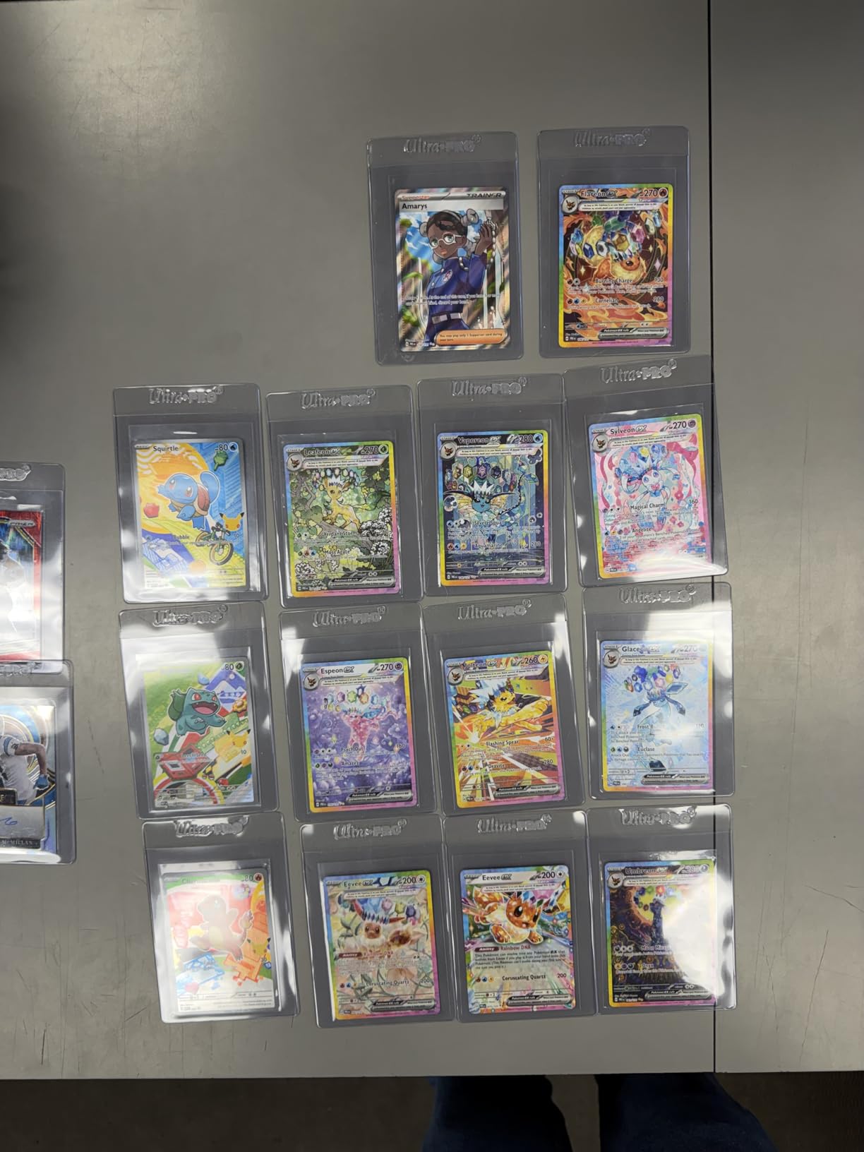 Pokemon Scarlet & Purple Elite Trainer Set - Prismatic Evolutions (1 Promo Card, 9 Booster Packs & Premium Game Accessories) customer photo 1