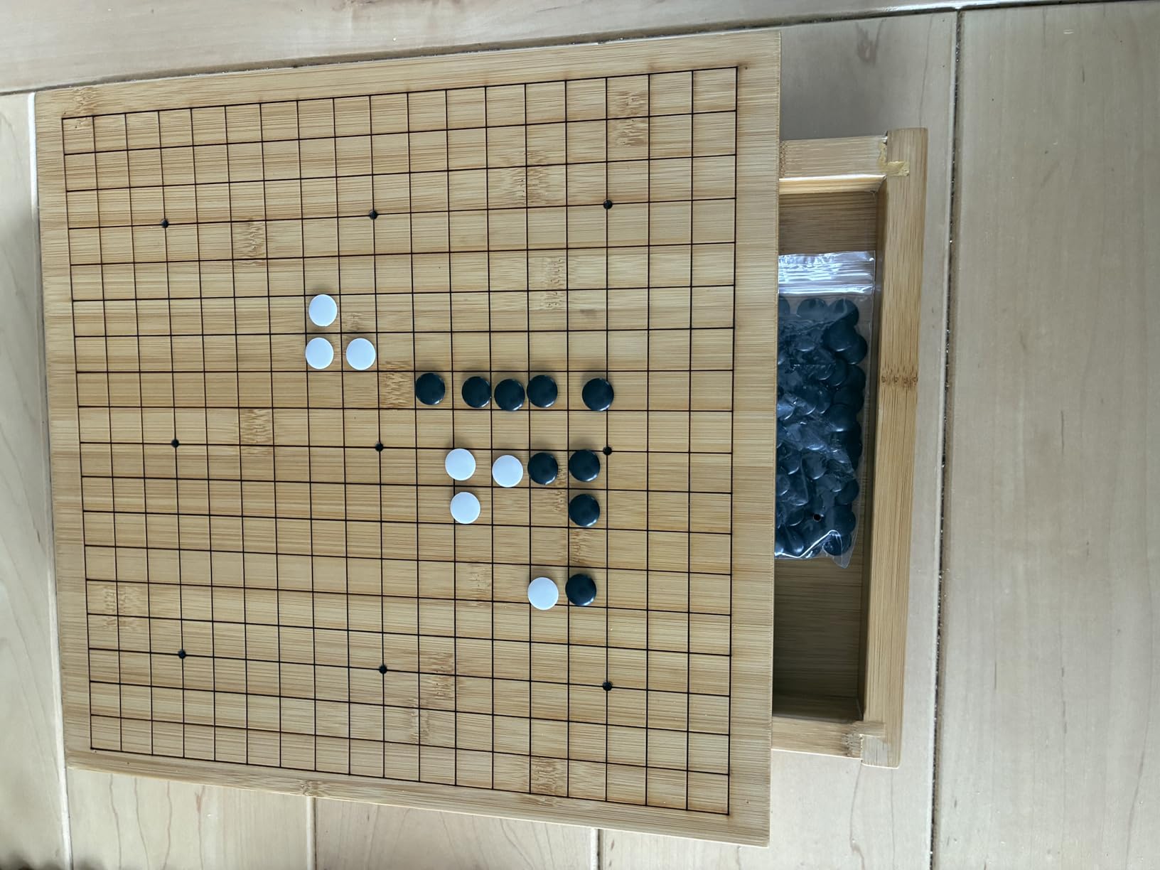 Bamboo Go Game Set - 12.6 x 12.2-Inch Wooden Board with Pull-Out Storage Drawers & Double Convex Melamine Stones by Yellow Mountain Imports customer photo 1