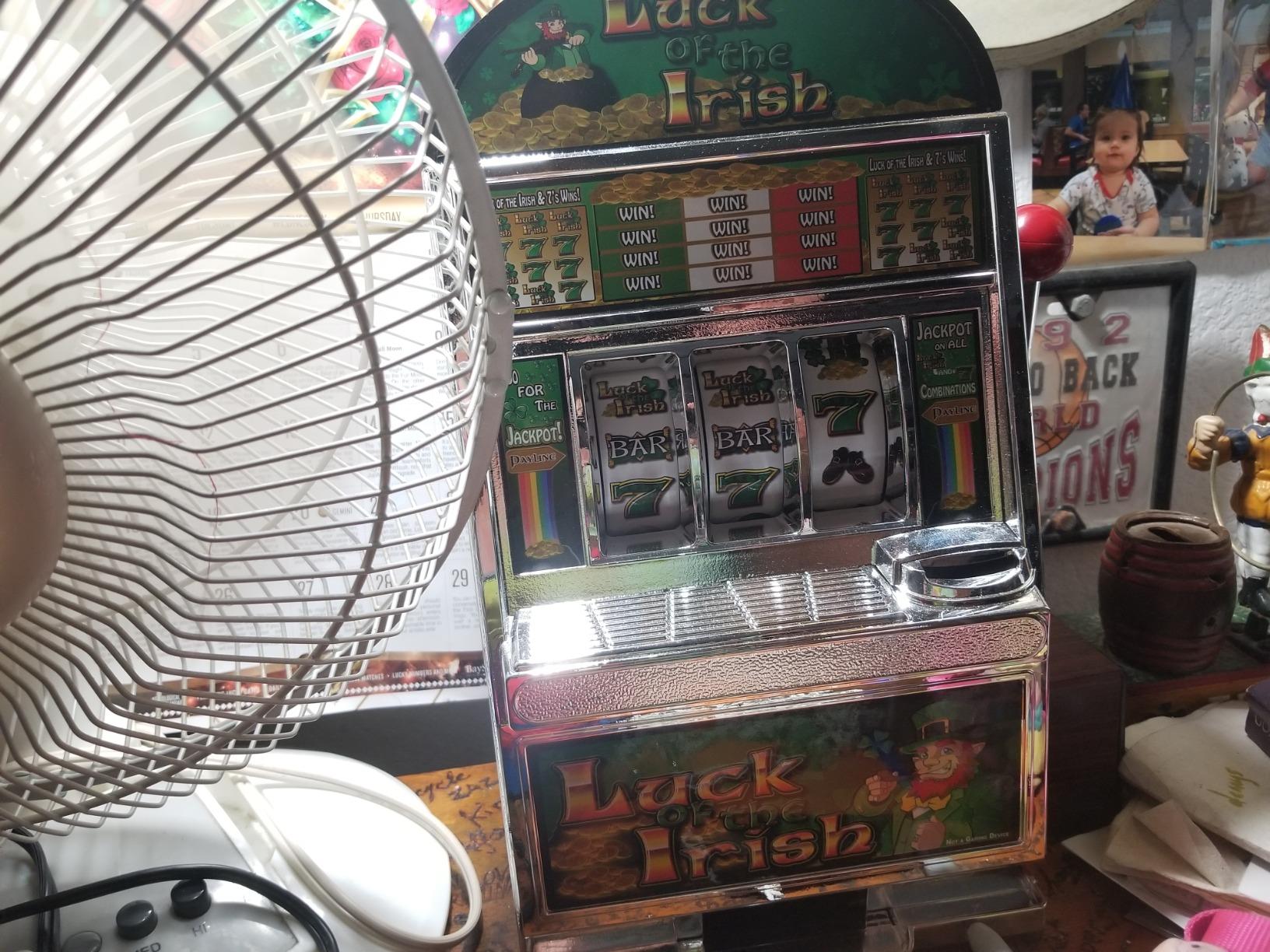 Slot Machine - Las Vegas Game with Casino Sounds, Flashing Lights, and Chrome Trim - Accepts 98-Percent of World Coins by Trademark Poker customer photo 1