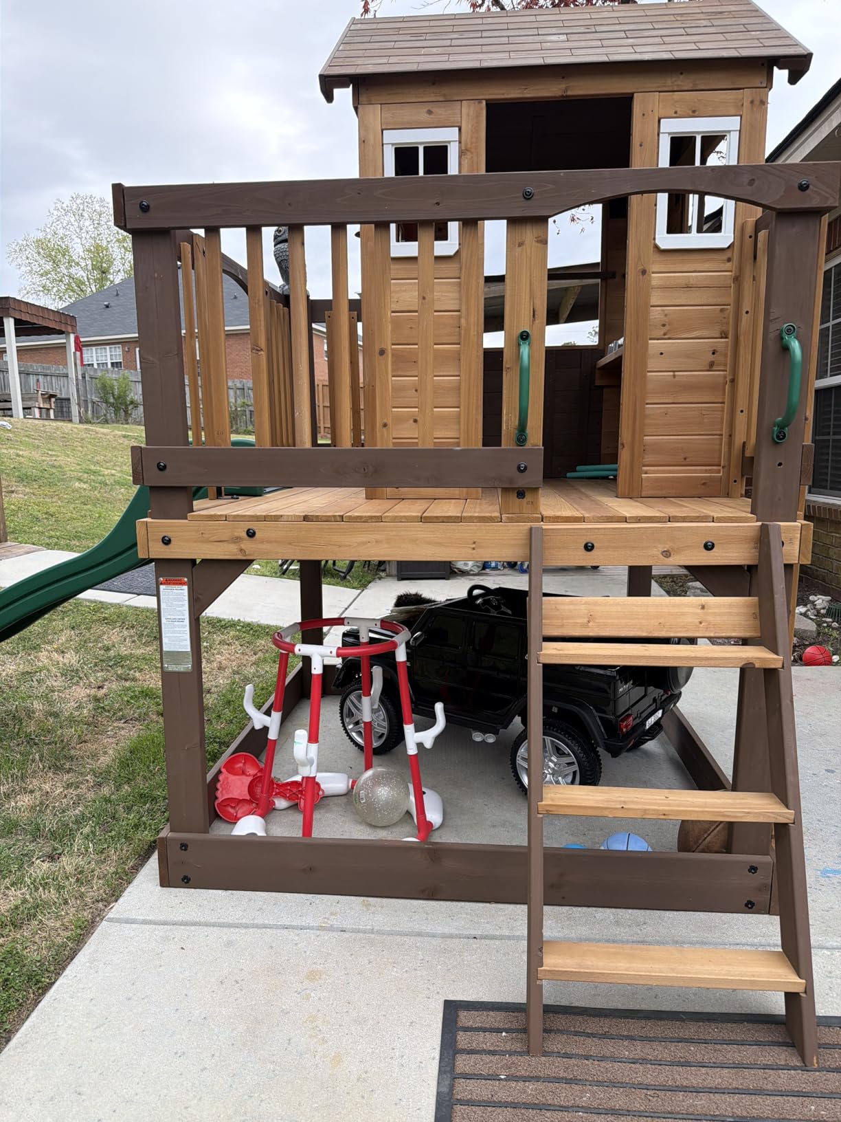 Backyard Discovery Beacon Heights Elevated Cedar Wooden Kids Playhouse with Wave Slide, Play Kitchen, Wrap-Around Deck, Flat-Step Ladder, Half Door, Windows, Bell, and Growth Chart for Outdoor Play customer photo 2