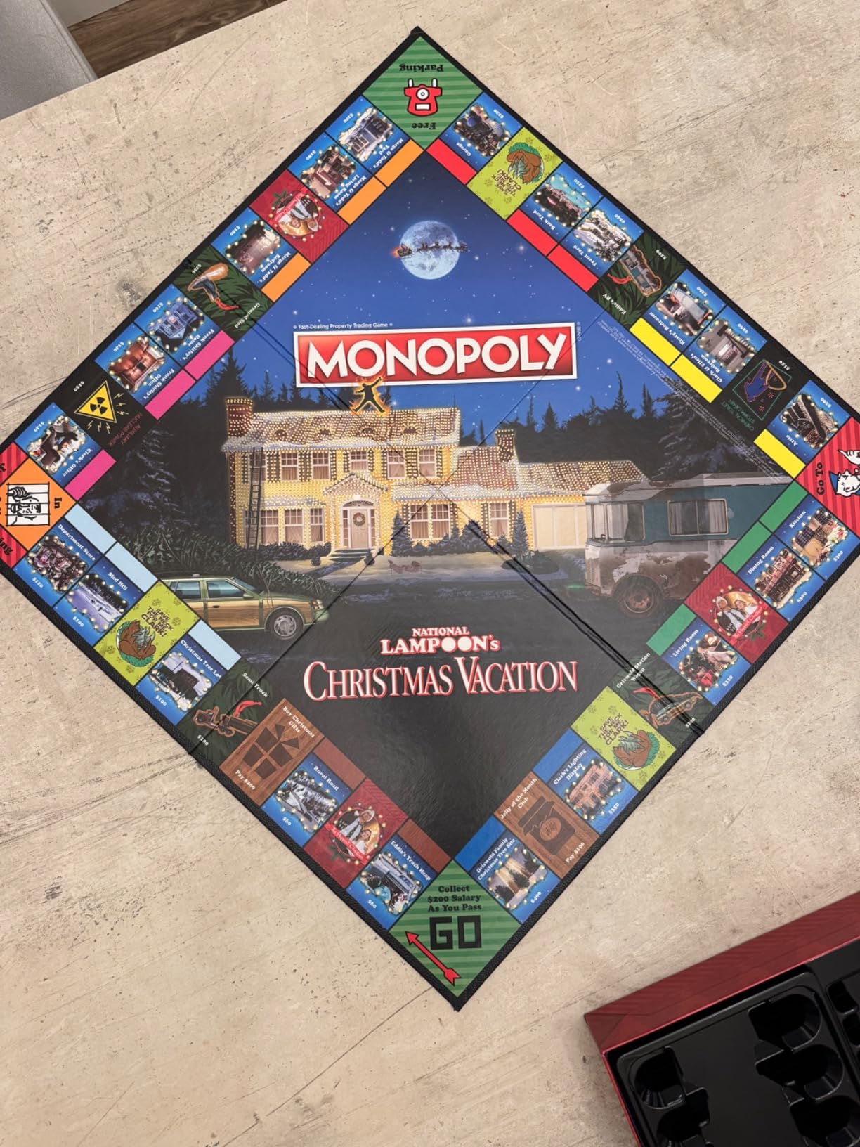 Monopoly National Lampoon's Christmas Vacation Board Game - Featuring Themed Tokens Squirrel, Egg Nog Glass, Chainsaw & More, 2-6 Players, Ages 15+ customer photo 1