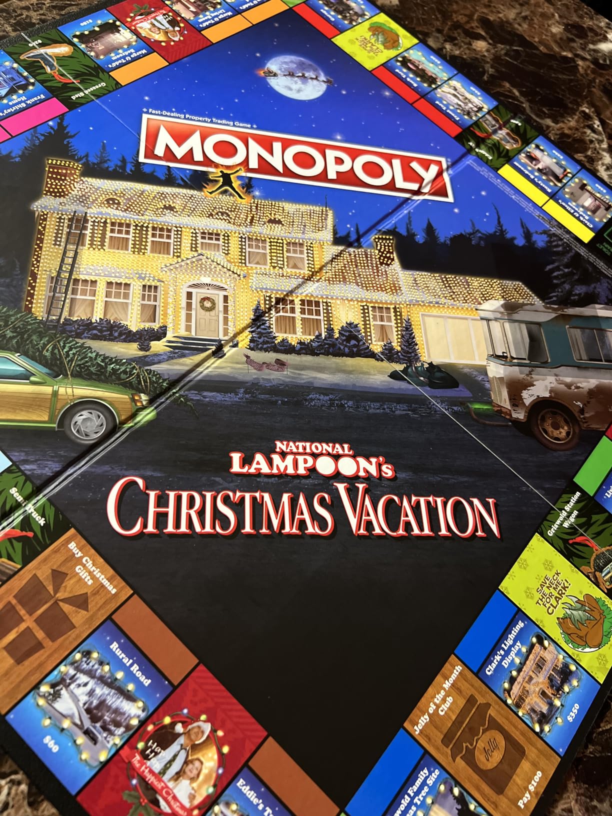 Monopoly National Lampoon's Christmas Vacation Board Game - Featuring Themed Tokens Squirrel, Egg Nog Glass, Chainsaw & More, 2-6 Players, Ages 15+ customer photo 2