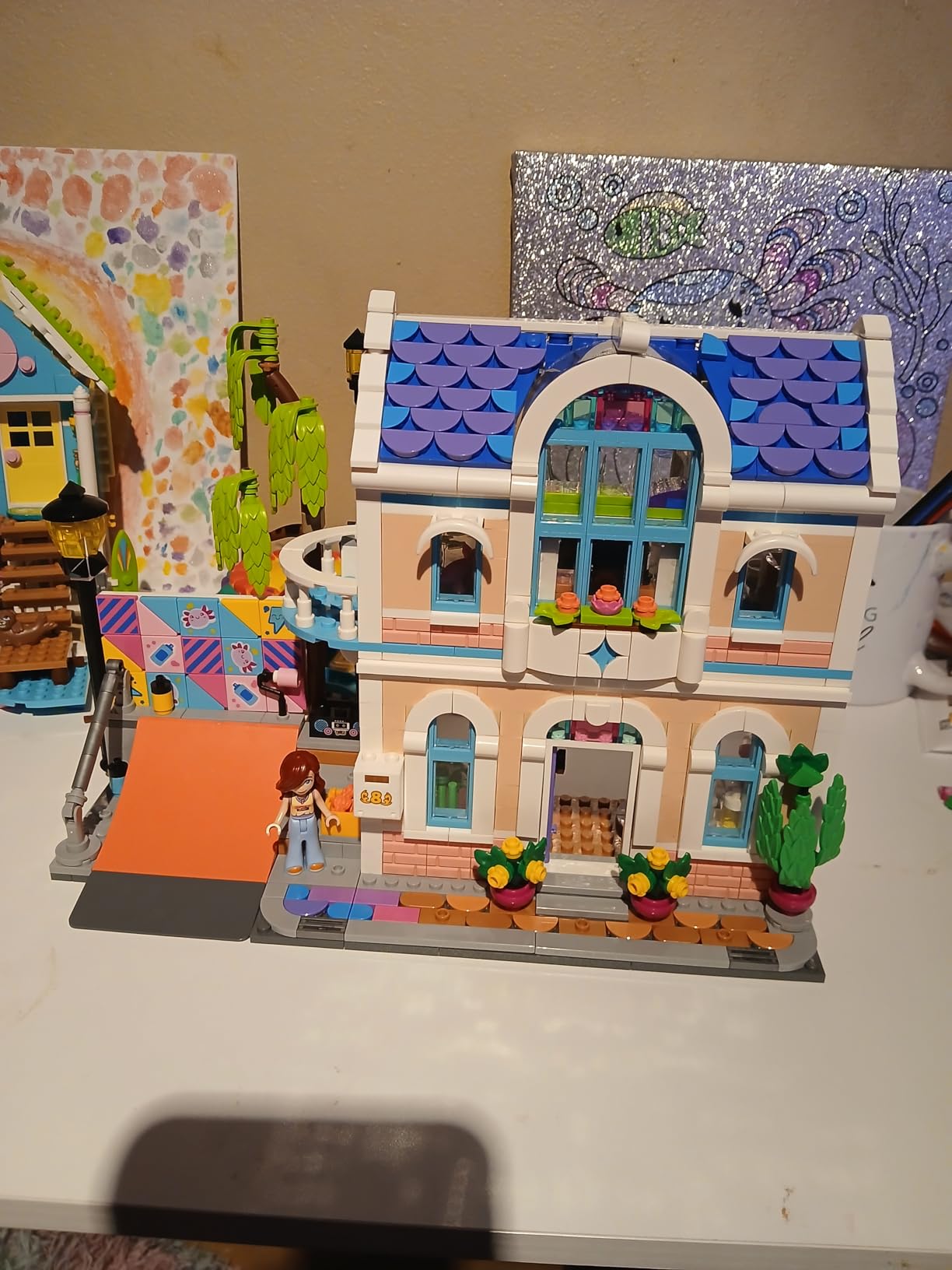 LEGO Friends Liann's Family House Building Toy for Girls & Boys - Pretend Play Set for Kids, Ages 7+ - W/4 Minidolls, 2 Toy Pet Figures, & Doll House Accessories - Gift Idea for Birthdays - 42687 customer photo 1