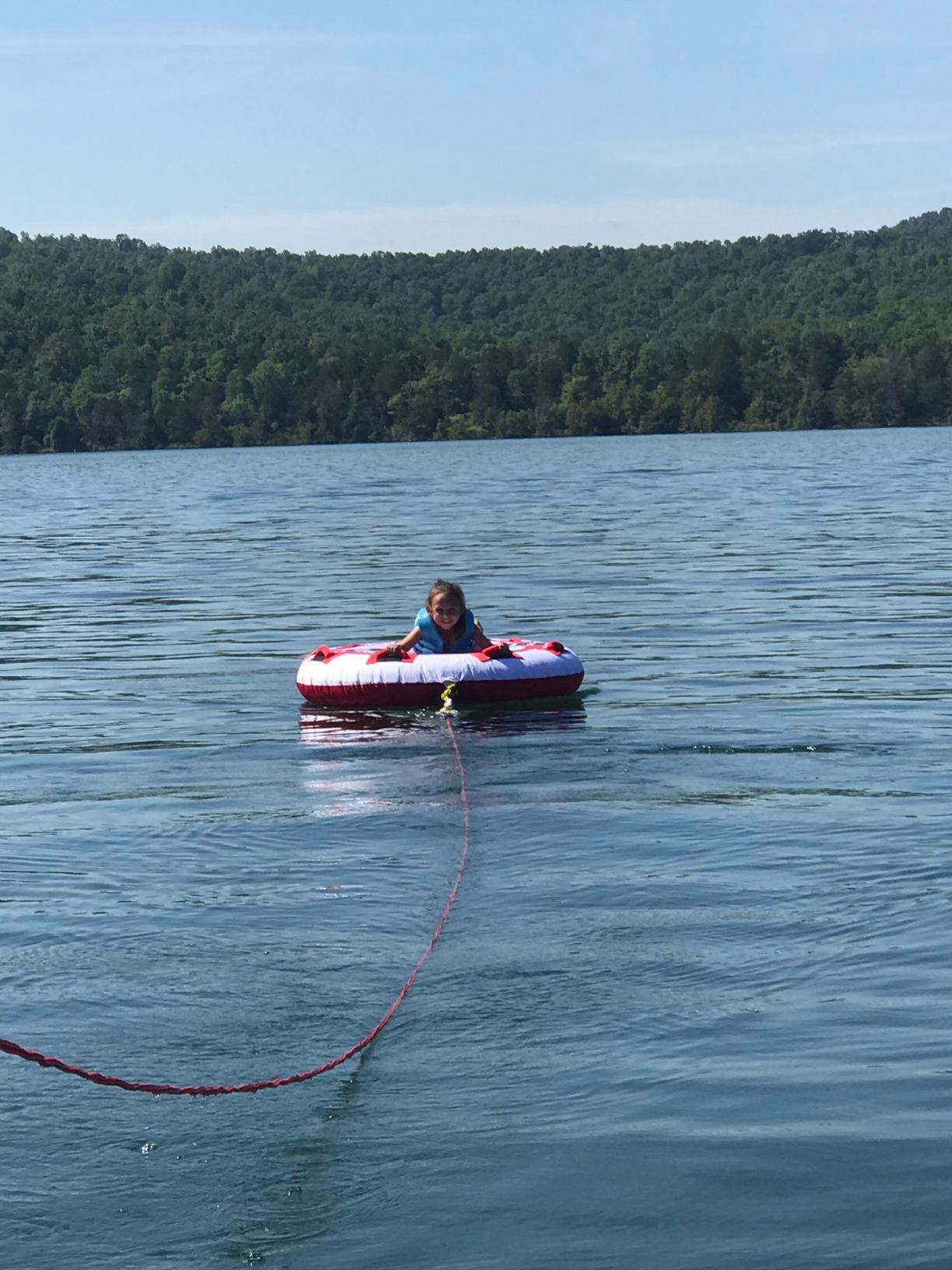 Airhead Hot Shot Towable Tube for Boating, 1 - 2 Rider Inflatable Boat Tube for Water Tubing, Round Deck for Air Time, Full Nylon Cover, Padded Handles with Neoprene Knuckle Guards, Speed Safety Valve customer photo 1