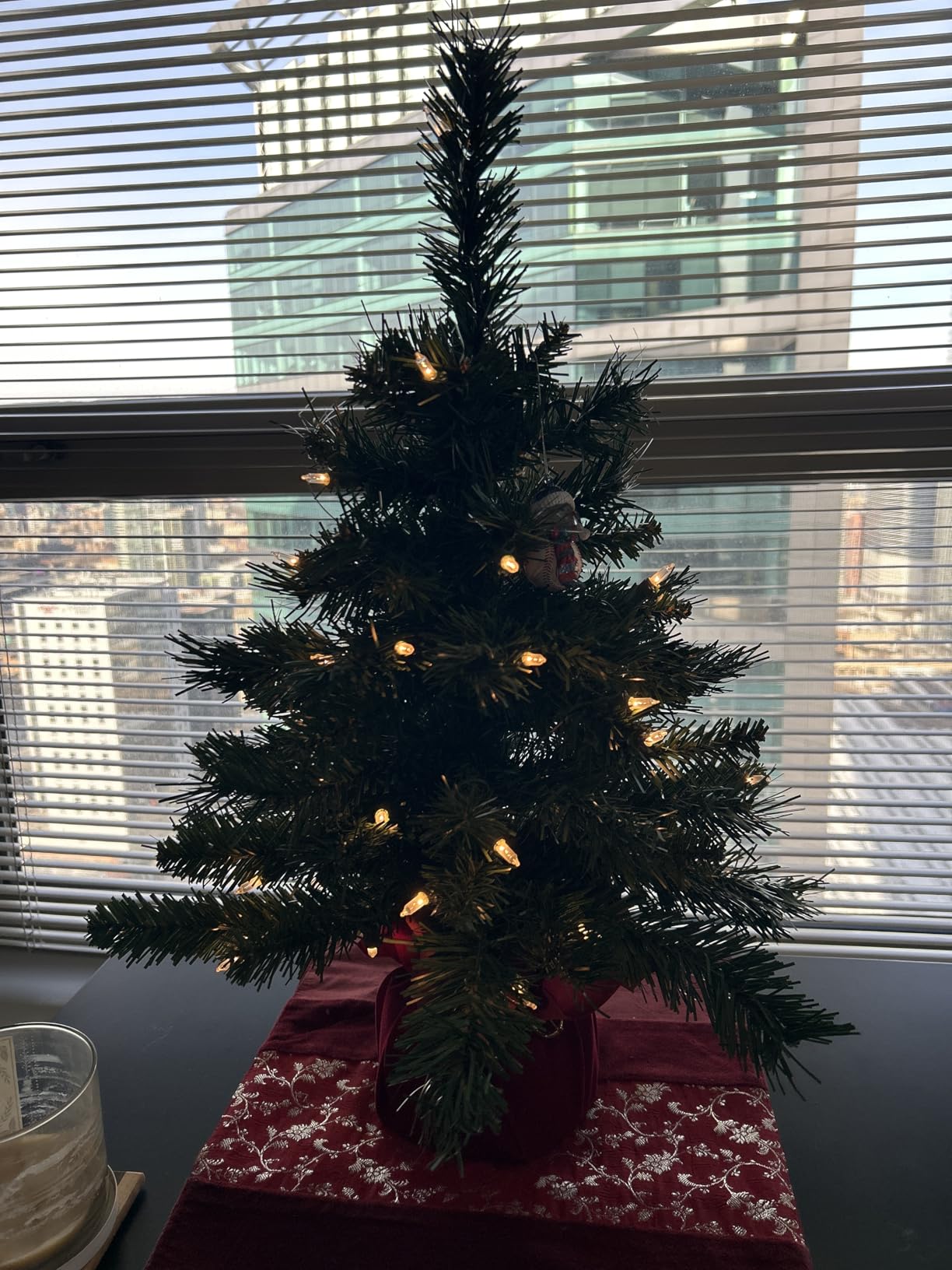 National Tree Company 24in Pre-Lit Majestic Fir Mini Christmas Tree | 35 Clear Lights, 71 Tips, Red Cloth Base, Artificial, Green customer photo 1