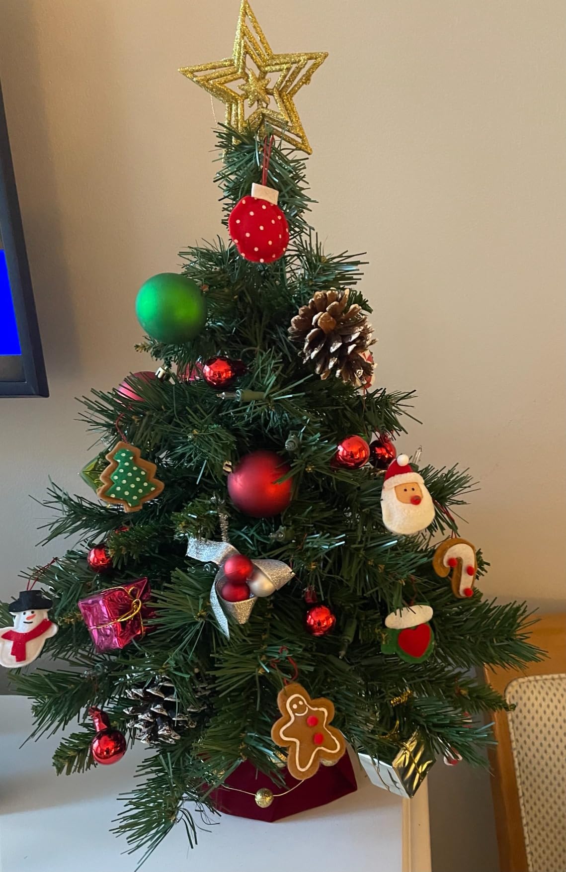 National Tree Company 24in Pre-Lit Majestic Fir Mini Christmas Tree | 35 Clear Lights, 71 Tips, Red Cloth Base, Artificial, Green customer photo 2