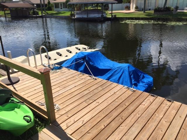 Budge Waterproof Trailerable Jet Ski Cover, Fits 121-135 in PWCs | Waterproof, UV-resistant PWC cover protects against sun, rain, dust & sap; Trailerable; Fits 121-135