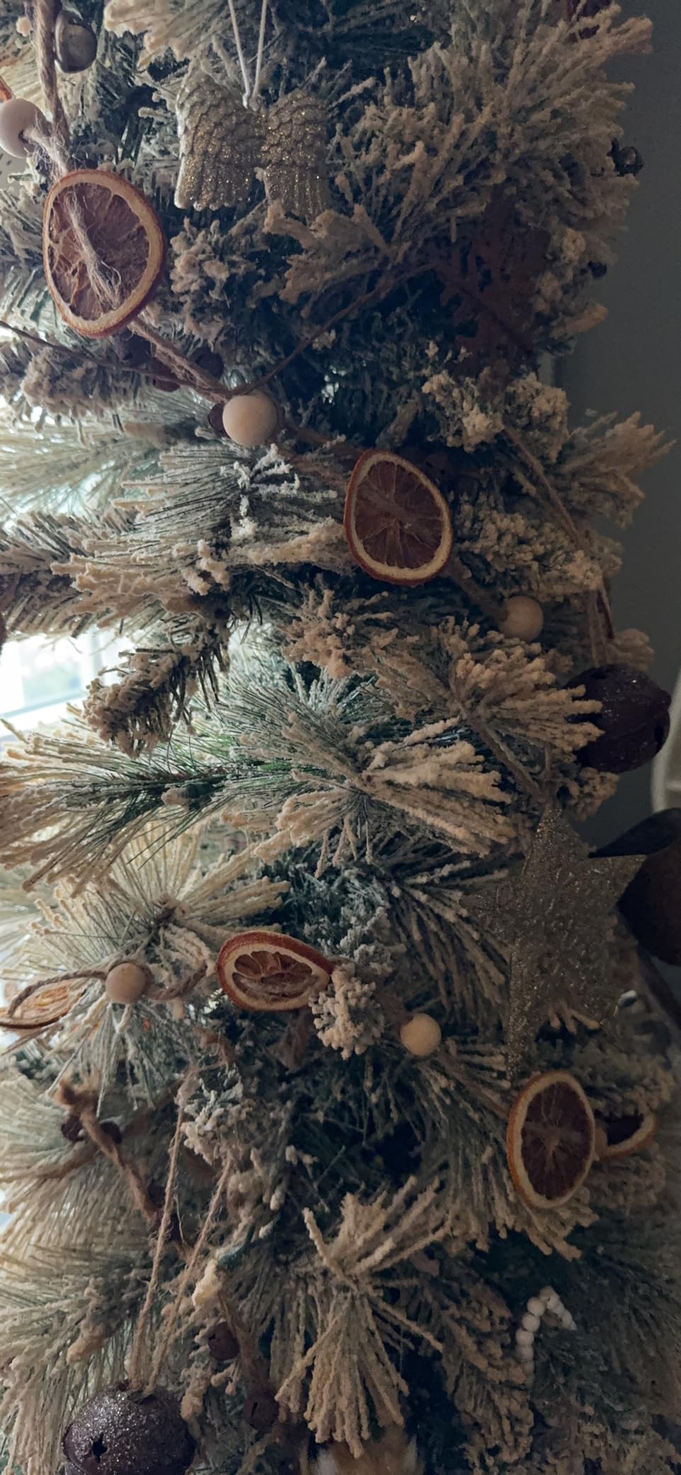 Puleo International 4.5ft Pre-Lit Flocked Portland Pine Pencil Christmas Tree with 100 Clear Lights, 195 Realistic Dense Snow Flocked Branch Tips, Easy Setup Artificial Trees with Sturdy Metal Stand customer photo 1