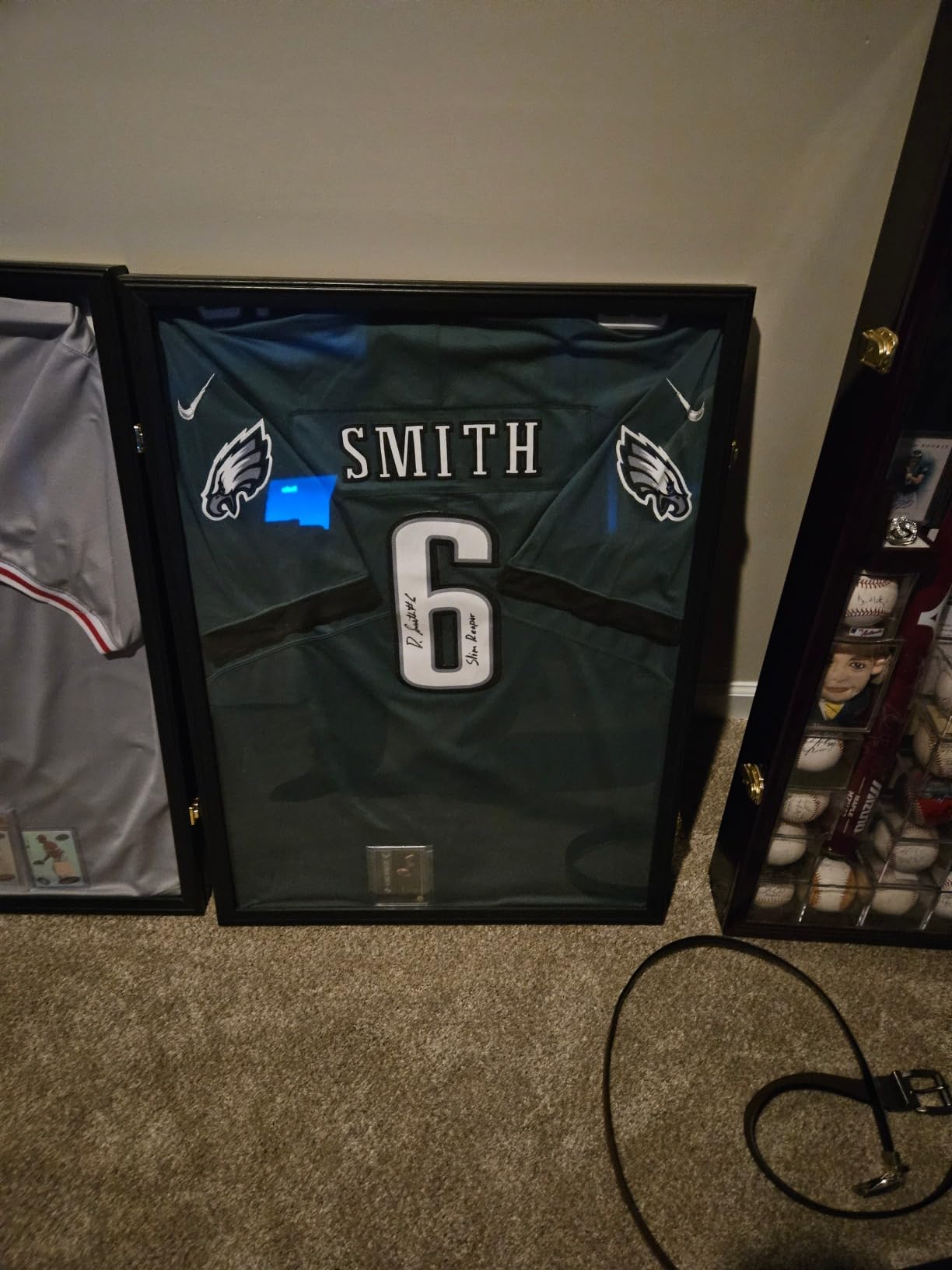 Jersey Frame Display Case, Large Lockable Shadow Box Sports Jersey Frame with UV Protection Acrylic and 2 Hanger for Baseball Basketball Football Soccer Hockey Shirt,Uniform, Graduates Black customer photo 2