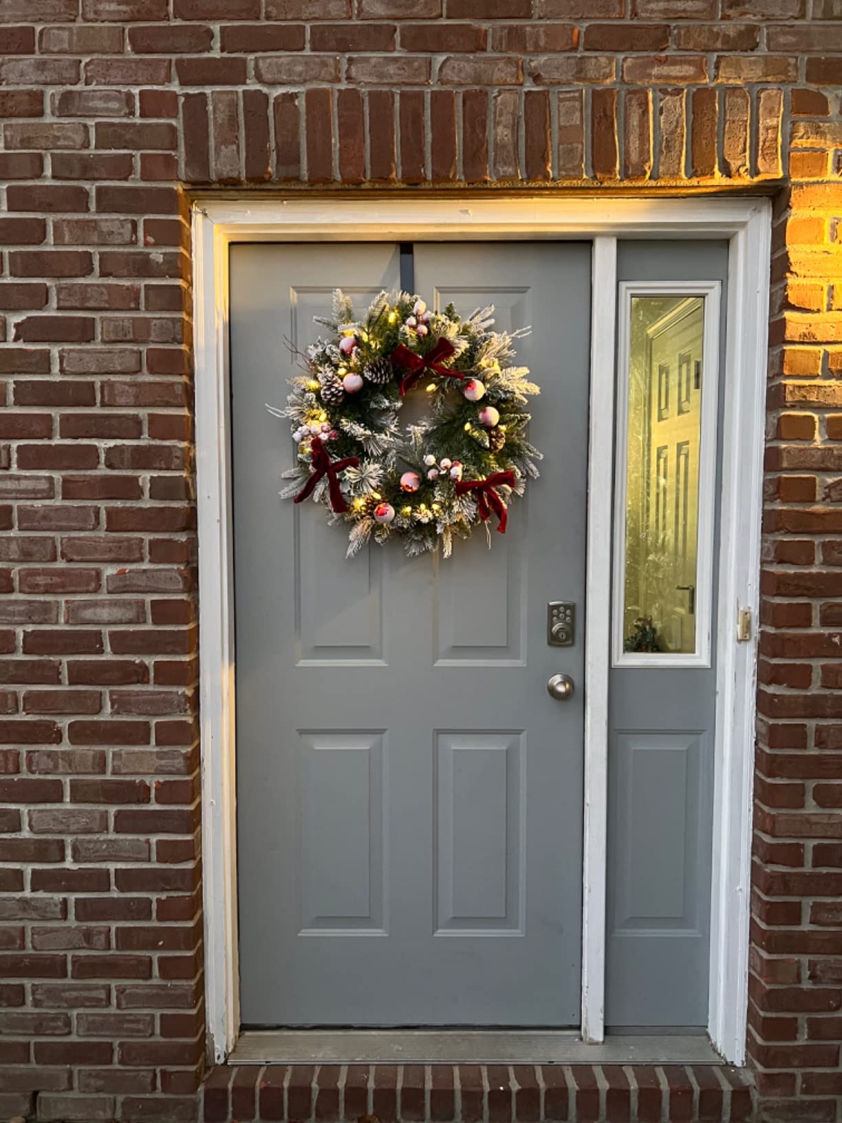 Pre-lit Snow Christmas Wreath with Red Balls, Berries and Bows, 24 Inch 50 Battery Operated LED Lights, Holiday Decoration for Front Door Outdoor customer photo 2