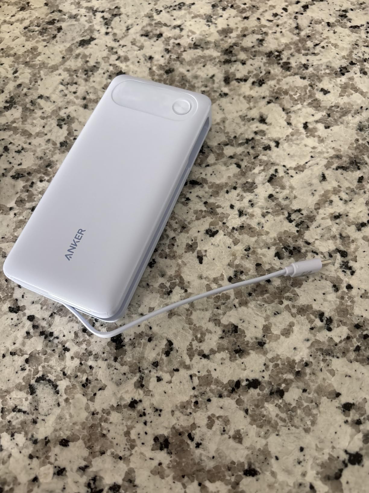 Anker Power Bank, 20,000mAh Travel Essential, Built-in USB-C Cable(Black) | 1 USB-C and 1 USB-A port, for MacBook Pro/Air, iPhone 17/16/15/14, Samsung, Switch and more customer photo 1