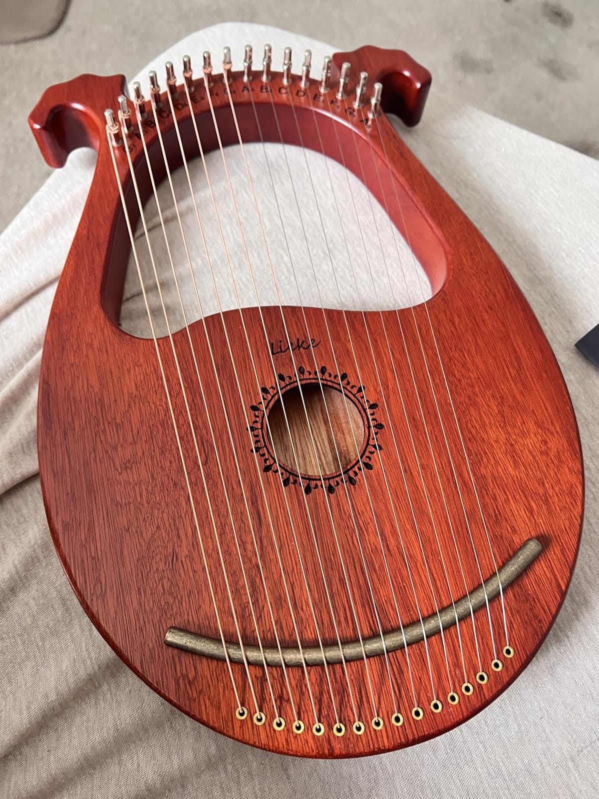 LIEKE 7 String Lyre Harp Instrument for Beginner Adults, Mahogany Body, Bone Saddle, Includes Tuning Wrench, Metal Strings, Bag, for Practice & Performance, Yoga Meditation Relaxation customer photo 1