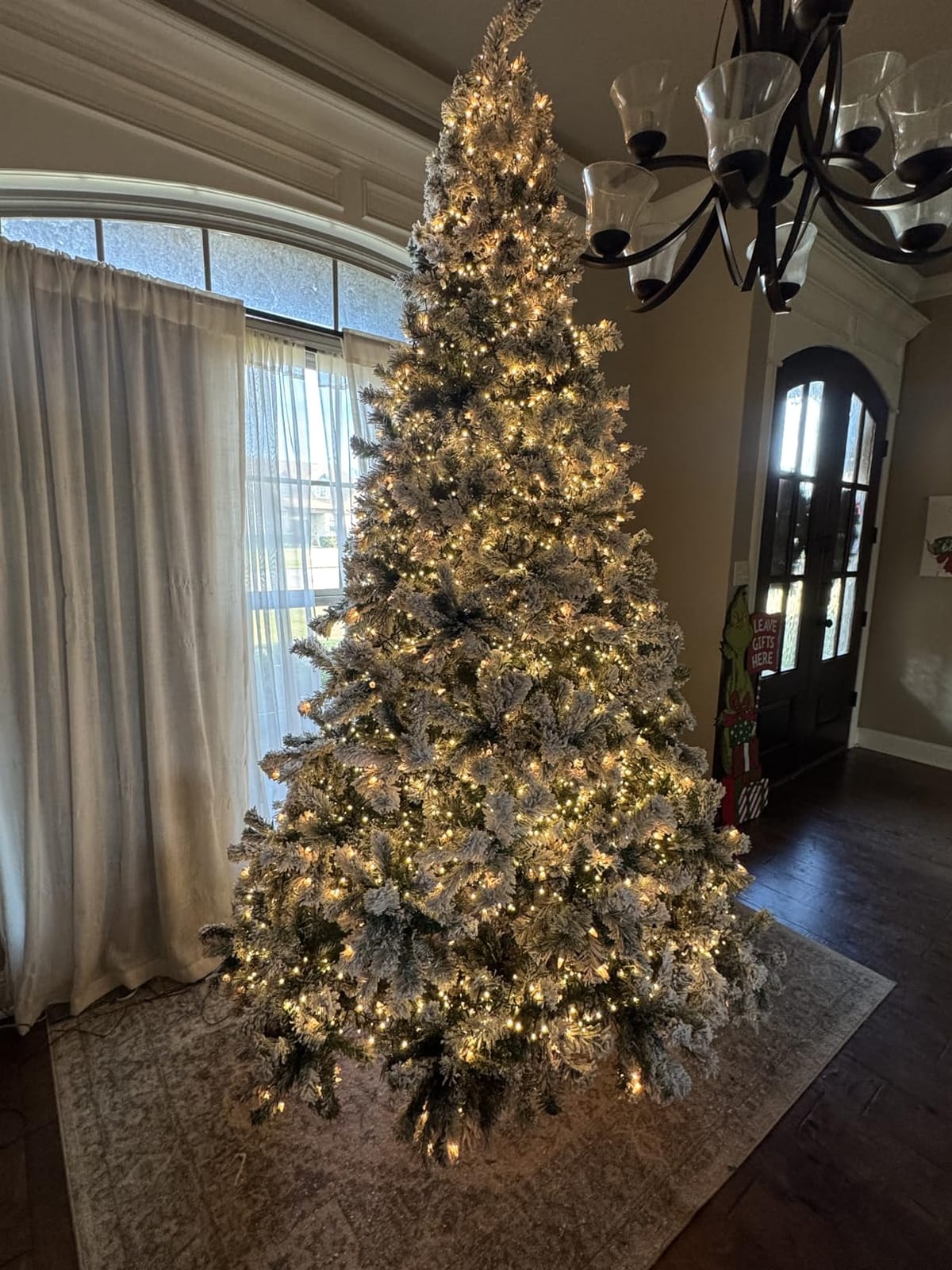 Yaheetech 9ft Prelit Artificial Christmas Tree with 900 Warm White Lights | 2084 PVC Branch Tips Look Full and Lifelike on a Steel Stand; Pre-Strung Lights Skip the Wiring for Fast Setup. Pure Green. customer photo 1