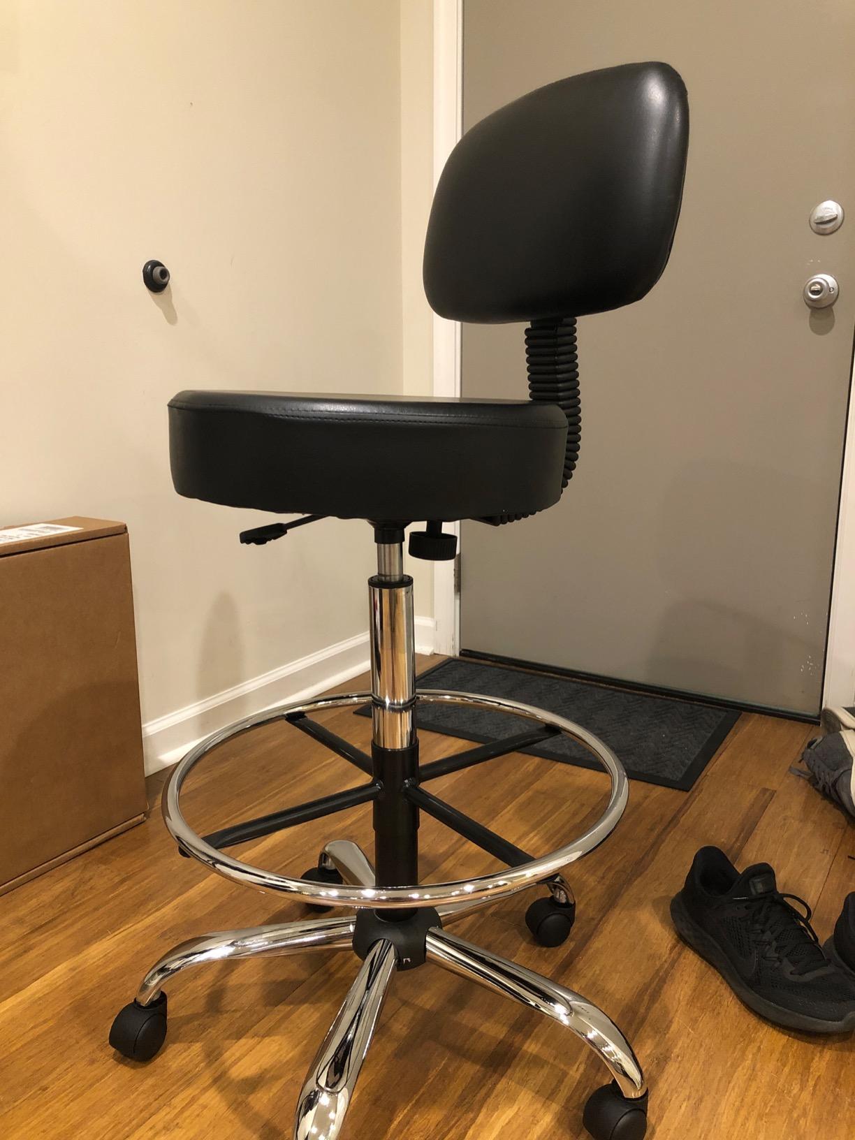 Amazon Basics Multi-Purpose Adjustable Drafting Spa Bar Stool with Sturdy Foot Rest, Back Support Cushion, 360° Swivel and Wheels, Black customer photo 1
