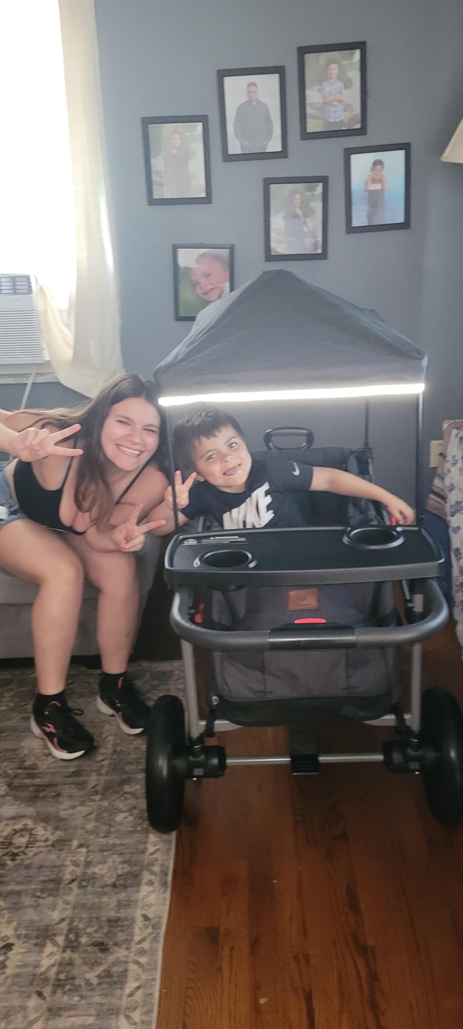 EVER ADVANCED Foldable Wagons for Two Kids & Cargo, Collapsible Folding Wagon Stroller with Adjustable Handle Bar,Removable Canopy with 5-Point Harness,Black customer photo 1