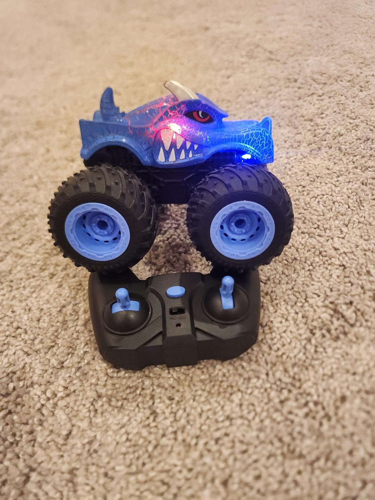 AUUGUU Remote Control Car, 2.4GHz Monster Trucks Toys with Light Spray, Birthday Gift for Kids 3 4 5 6 7 8, All Terrain RC Cars, Toys for Boys Girls 3+ Year Old customer photo 1